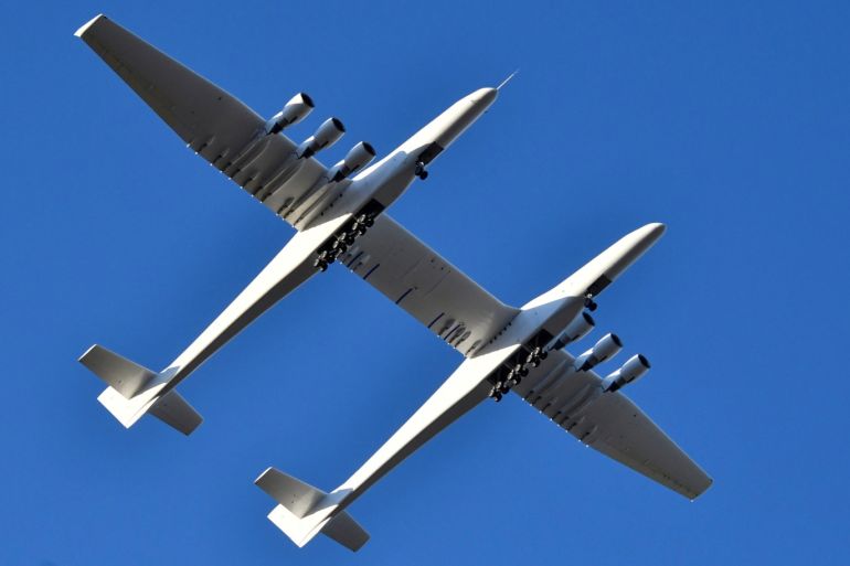 The world's largest airplane, built by the late Paul Allen's company Stratolaunch Systems, makes its first test flight in Mojave, California, U.S. April 13, 2019. REUTERS/Gene Blevins