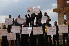 Commemoration of Khan Shaykhun victims in Idlib- - IDLIB, SYRIA - APRIL 04: People hold placards as they gather to commemorate their relatives who lost their lives in Assad regime forces' chemical gas attack on April 2017, in Khan Shaykhun town of Idlib district of Syria on April 04, 2019. Two years ago, Assad regime forces' chemical chlorine gas attack massacred civilians in Khan Shaykhun town of Syria's Idlib.