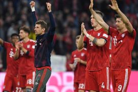 Soccer Football - Bundesliga - Bayern Munich v Borussia Dortmund - Allianz Arena, Munich, Germany - April 6, 2019 Bayern Munich's Thomas Mueller celebrates after the match with team mates REUTERS/Andreas Gebert DFL regulations prohibit any use of photographs as image sequences and/or quasi-video