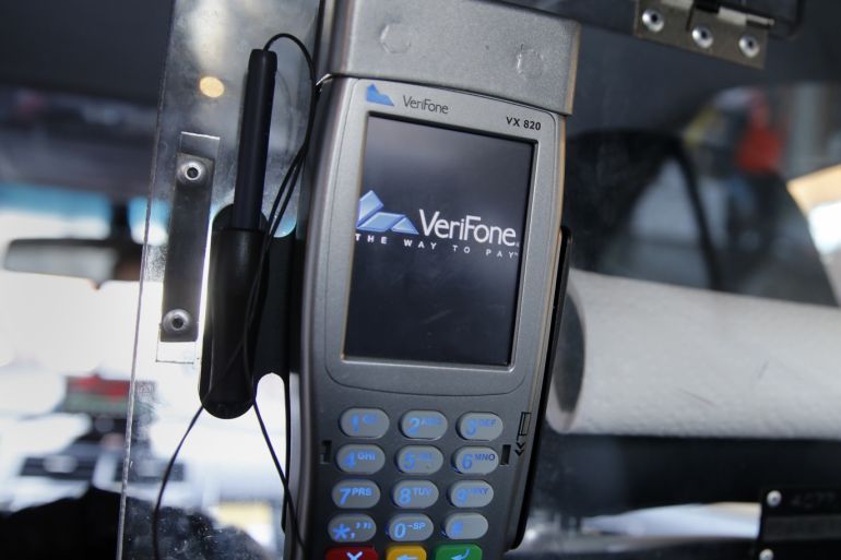 A credit card payment terminal is seen photographed in New York March 2, 2015. New technology required by credit card companies will need U.S. consumers to carry a new kind of credit card and retailers across the nation to upgrade payment terminals. Picture taken March 2, 2015. REUTERS/Shannon Stapleton (UNITED STATES - Tags: BUSINESS)
