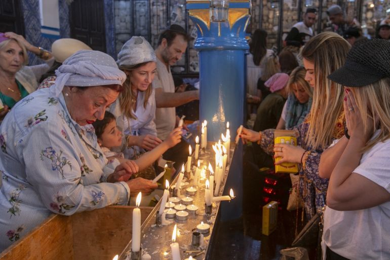 Jewish people pilgrimage to Tunisia's El-Ghriba synagogue - - TUNIS, TUNISIA - MAY 22: Pilgrims participate in an annual Jewish pilgrimage to the El Ghriba Synagogue, the oldest Jewish monument built in Africa, on Tunisia's island of Djerba on May 22, 2019.