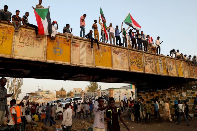 Ramadan in Sudan- - KHARTOUM, SUDAN - MAY 06: Sudanese demonstrators attend the ongoing protests demanding a civilian transition government in front of military headquarters, on the first day of Holy month of Ramadan in Khartoum, Sudan on May 06, 2019.