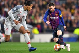 BARCELONA, SPAIN - MAY 01: Virgil van Dijk of Liverpool looks on as Lionel Messi of Barcelona controls the ball during the UEFA Champions League Semi Final first leg match between Barcelona and Liverpool at the Nou Camp on May 01, 2019 in Barcelona, Spain. (Photo by Michael Regan/Getty Images)