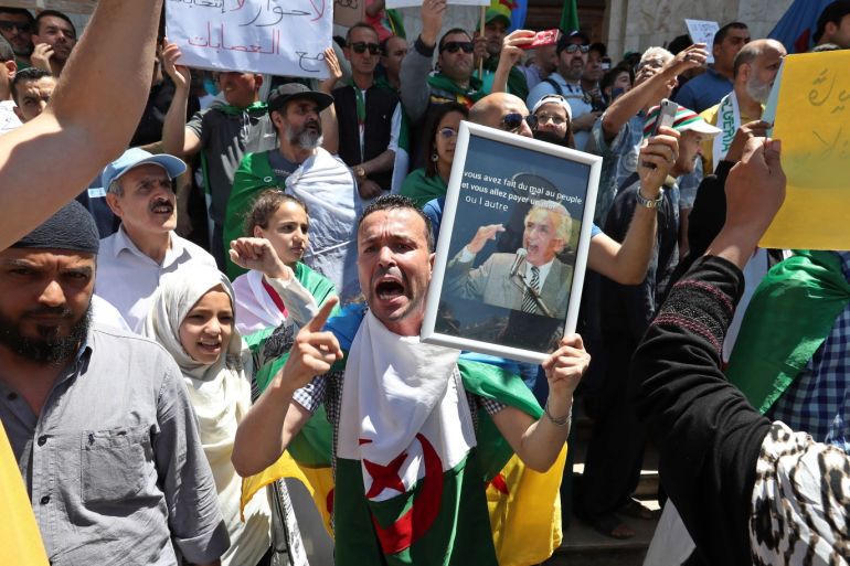 epa07560408 Algerians protest during a demonstration for the departure of the Algerian regime in Algiers, Algeria, 10 May 2019. Media reports state that the protesters are demanding the departure of the Algerian government. EPA-EFE/MOHAMED MESSARA