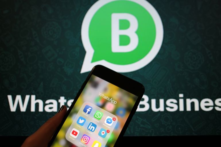WhatsApp Business API- - ANKARA, TURKEY - SEPTEMBER 1: Logo of WhatsApp application is seen in front of a screen reading WhatApp Business in Ankara, Turkey on September 1, 2018.