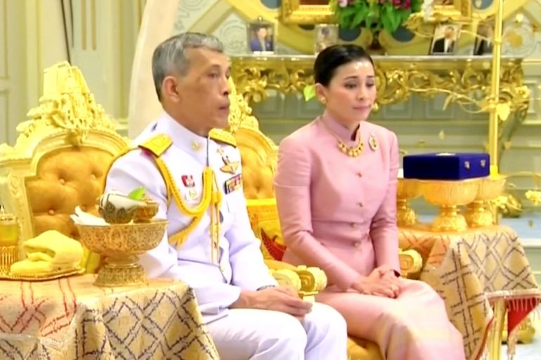 King Maha Vajiralongkorn and his consort, General Suthida Vajiralongkorn named Queen Suthida attend their wedding ceremony in Bangkok, Thailand May 1, 2019, in this screen grab taken from a video. Thai TV Pool THAILAND OUT. NO COMMERCIAL OR EDITORIAL SALES IN THAILAND.