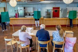 People vote at a polling station during the European Parliament election in Lerum, Sweden May 26, 2019. TT News Agency/Adam Ihse via REUTERS ATTENTION EDITORS - THIS IMAGE WAS PROVIDED BY A THIRD PARTY. SWEDEN OUT.