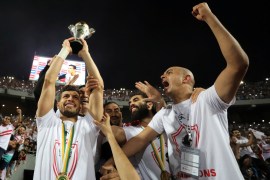 REFILE - CORRECTING TYPO IN COUNTRY Soccer Football - CAF Confederation Cup Final Second Leg - Zamalek v RBS Berkane - Borg El Arab Stadium, Alexandria, Egypt - May 27, 2019 Zamalek's Tarek Hamed celebrates with the trophy after winning the CAF Confederation Cup REUTERS/ Mohamed Abd El Ghany