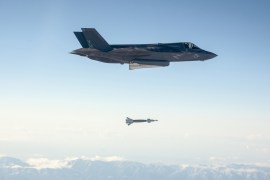 A U.S. Marine Corps F-35B short take-off and vertical landing (STOVL) fighter jet drops a laser-guided bomb during its first guided weapons release test at Edwards Air Force Base, California October 29, 2013. The Lockheed Martin Corp F-35 fighter jet dropped a 500-pound bomb this week, hitting a tank at Edwards Air Force Base in California and marking the first time the new warplane has fired a weapon, the Pentagon said Wednesday. Picture taken October 29, 2013. REUTER