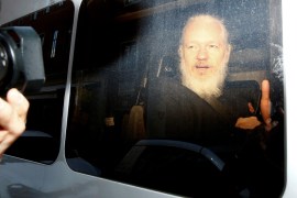 WikiLeaks founder Julian Assange is seen in a police van after he was arrested by British police in London Britain April 11 2019. REUTERS/Henry Nicholls
