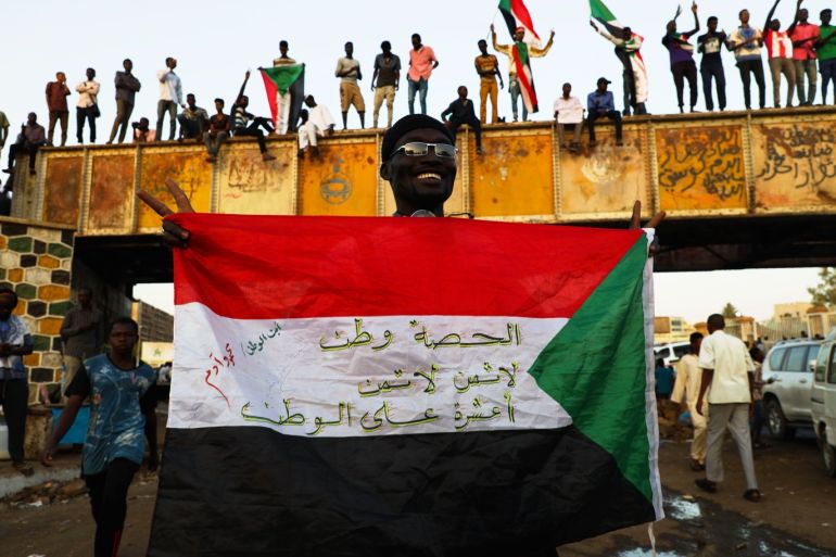 Ramadan in Sudan- - KHARTOUM, SUDAN - MAY 06: Sudanese demonstrators attend the ongoing protests demanding a civilian transition government in front of military headquarters, on the first day of Holy month of Ramadan in Khartoum, Sudan on May 06, 2019.