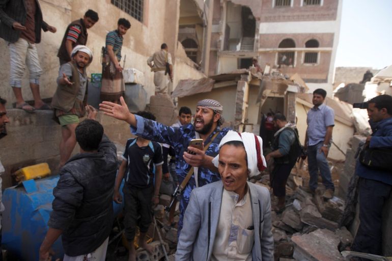 People gather at the site of an air strike launched by the Saudi-led coalition in Sanaa, Yemen May 16, 2019. REUTERS/Mohamed al-Sayaghi