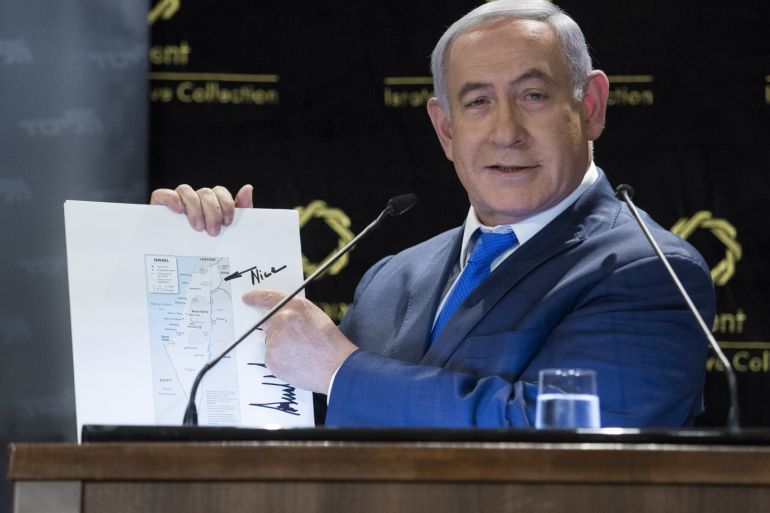 JERUSALEM, ISRAEL - MAY 30: Israeli Prime Minister Benjamin Netanyahu presents a map of Israel with the Golan Heights, signed by US President Donald Trump during a press conference on May 30, 2019 in Jerusalem, Israel. Israelis will now have to return to the polls for new elections on September 17, 2019. (Photo by Amir Levy/Getty Images)