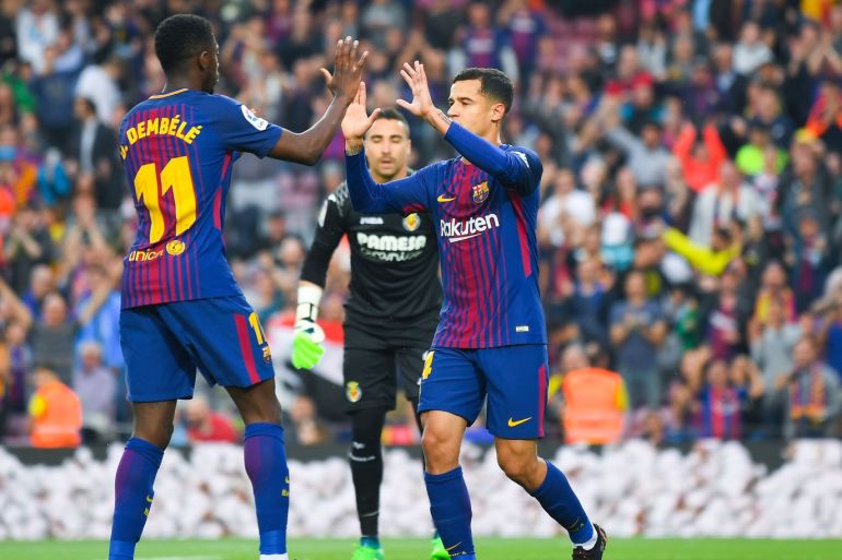 BARCELONA, SPAIN - MAY 09: Philippe Coutinho (R) of FC Barcelona celebrates with his team mate Oussame Dembele after scoring his team's first goal the La Liga match between Barcelona and Real Madrid at Camp Nou on May 9, 2018 in Barcelona, Spain. (Photo by David Ramos/Getty Images)