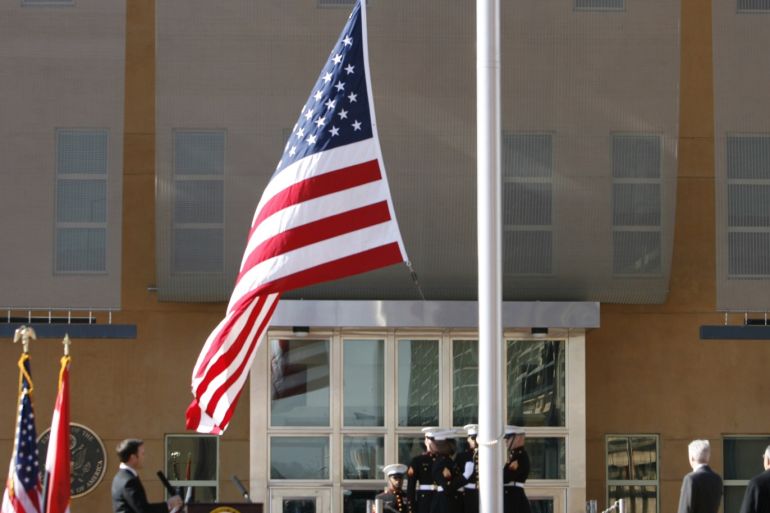 BAGHDAD, IRAQ - JANUARY 5: The US flag is raised during a formal dedication ceremony attended by the Iraqi President Jalal Talabani, at the new US embassy amid heavy security, in Green Zone, on January 5, 2009 in Baghdad, Iraq. The embassy compound is the biggest and most expensive that the US have built and will house 4000 staff. (Photo by Getty Images)