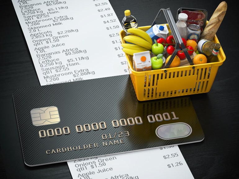 Shopping cart with food and drinks, credit card and receipt with list of expenses.  Online purchasing of products by credit card or family budget concept.  3d illustration