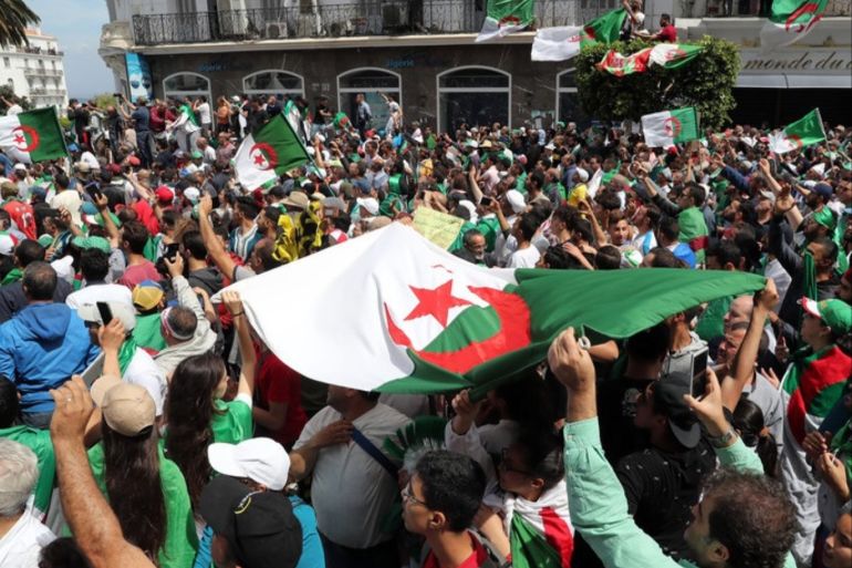 epa07578884 Algerians protest during a demonstration for the departure of the Algerian regime in Algiers, Algeria, 17 May 2019. according to the local media reports, Algerian Ministry of Interior reported that 73 potential candidates have asked forms to collect the required signatures to run the next presidential election scheduled for 4 July. the protesters are demanding the departure of the Algerian government t EPA-EFE/MOHAMED MESSARA