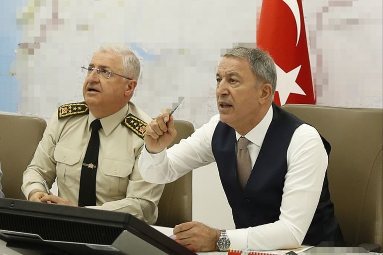 Turkish National Defense Minister Hulusi Akar- - ANKARA, TURKEY - MAY 4 : Turkish National Defense Minister Hulusi Akar (3rd R) conducts the operations against terrorist organizations at the operation center in the Turkish General Staff Headquarters in Ankara, Turkey on May 4, 2019.