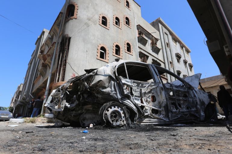Trablus'a roket saldırısı- - TRIPOLI, LIBYA - APRIL 17: A wreckage of a vehicle is seen after East Libya-based forces led by commander Khalifa Haftar carried out rocket attacks at the Abu Salim neighborhood in Tripoli, Libya on April 17, 2019.