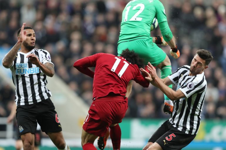 Soccer Football - Premier League - Newcastle United v Liverpool - St James' Park, Newcastle, Britain - May 4, 2019 Liverpool's Mohamed Salah sustains an injury after clashing with Newcastle United's Martin Dubravka REUTERS/Scott Heppell EDITORIAL USE ONLY. No use with unauthorized audio, video, data, fixture lists, club/league logos or