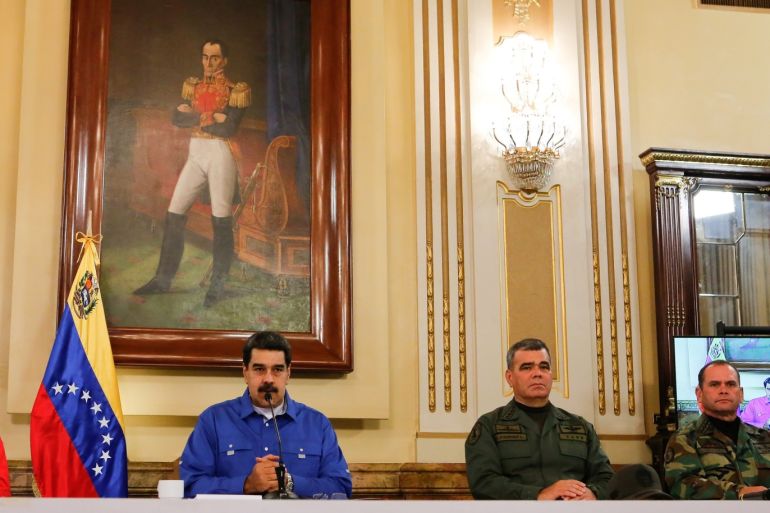 Venezuela's President Nicolas Maduro speaks next to Venezuela's National Constituent Assembly President Diosdado Cabello, Venezuela's Defense Minister Vladimir Padrino Lopez and Remigio Ceballos Strategic Operational Commander of the Bolivarian National Armed Forces, during a broadcast at Miraflores Palace in Caracas, Venezuela April 30, 2019. Miraflores Palace/Handout via REUTERS ATTENTION EDITORS - THIS PICTURE WAS PROVIDED BY A THIRD PARTY.