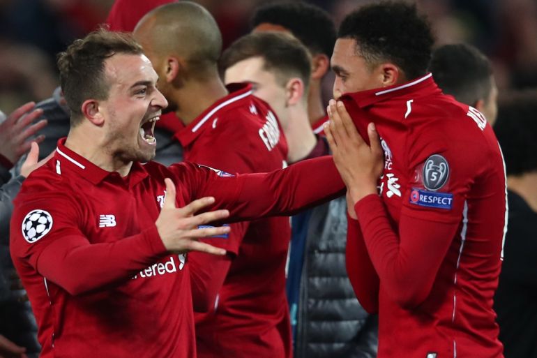 LIVERPOOL, ENGLAND - MAY 07: Xherdan Shaqiri and Trent Alexander-Arnold of Liverpool celebrate after the UEFA Champions League Semi Final second leg match between Liverpool and Barcelona at Anfield on May 07, 2019 in Liverpool, England. (Photo by Clive Brunskill/Getty Images)