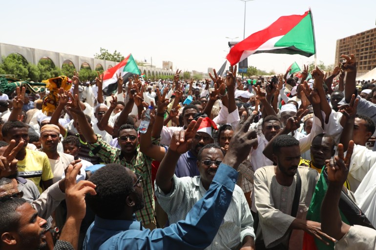 Protests in Sudan- - KHARTOUM, SUDAN - MAY 3 : Sudanese demonstrators gather to protest demanding a civilian transition government in front of military headquarters outside the army headquarters in Khartoum, Sudan on May 3, 2019.