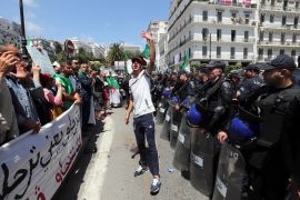 epaselect epa07578271 Algerians protest during a demonstration for the departure of the Algerian regime in Algiers, Algeria, 17 May 2019. Media reports state that the protesters are demanding the departure of the Algerian government. EPA-EFE/MOHAMED MESSARA