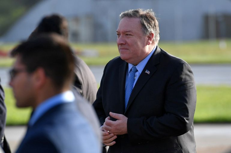 U.S. Secretary of State Mike Pompeo walks to board a plane before departing from London Stansted Airport, north of London, Britain May 9, 2019. Mandel Ngan/Pool via REUTERS