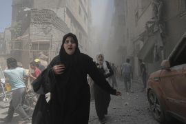 Airstrikes hit Syria's Idlib- - IDLIB, SYRIA - MAY 27 : Civilians leave the area after airstrikes by Assad Regime hit the de-escalation zone of Ariha in Idlib, Syria on May 27, 2019. 9 people were reported killed and 28 injured.