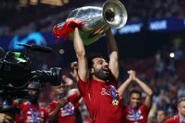 MADRID, SPAIN - JUNE 01: Mohamed Salah of Liverpool lifts the Champions League Trophy following the UEFA Champions League Final between Tottenham Hotspur and Liverpool at Estadio Wanda Metropolitano on June 01, 2019 in Madrid, Spain. (Photo by Clive Rose/Getty Images)