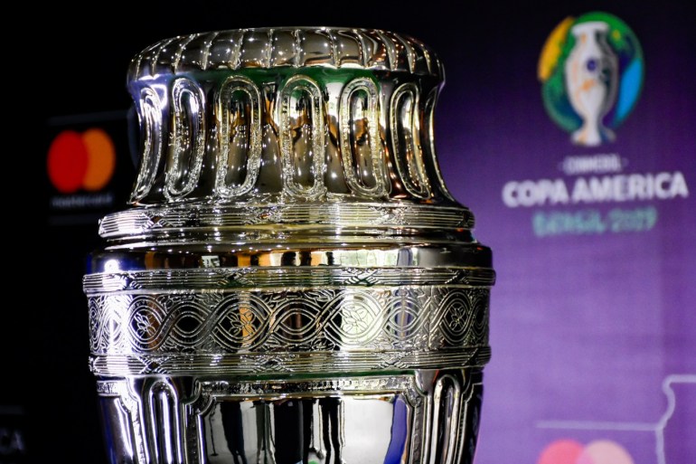 The Copa America trophy in Colombia- - BOGOTA, COLOMBIA - MAY 07: The Copa America trophy is exhibited at the Banco de Bogota building during the 'Trophy Tour' in Bogota, Colombia on May 7, 2019.