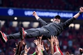 MADRID, SPAIN - JUNE 01: Jurgen Klopp, Manager of Liverpool is thrown in the air as he celebrates with his players and staff after winning the UEFA Champions League Final between Tottenham Hotspur and Liverpool at Estadio Wanda Metropolitano on June 01, 2019 in Madrid, Spain. (Photo by Laurence Griffiths/Getty Images)
