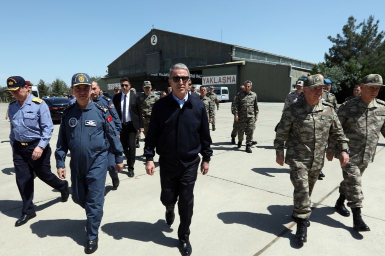 Turkish Defense Minister Hulusi Akar- - MALATYA, TURKEY - MAY 17 : Turkish Defense Minister Hulusi Akar (C)nspects the 7th Main Jet Base Command in eastern Malatya where F-35 fighter jets will be deployed on May 17, 2019.
