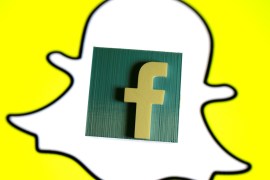 A 3D printed Facebook logo is seen in front of a displayed Snapchat logo in this picture illustration taken August 11, 2017. REUTERS/Dado Ruvic/Illustration