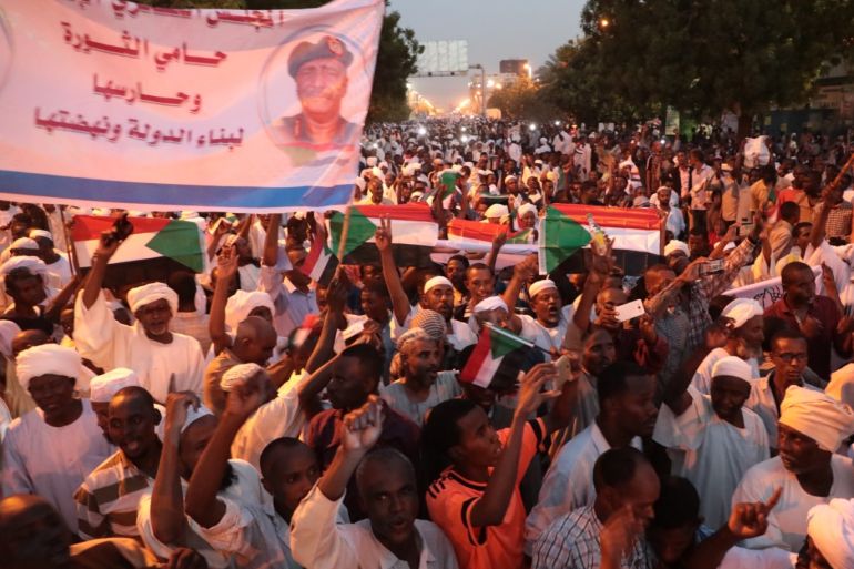 Demonstration in Khartoum- - KHARTOUM, SUDAN - MAY 31: Sudanese people, member of Islamic groups, attend a march to demonstrate in support of transitional military council in front of presidential palace in Khartoum, Sudan on May 31, 2019.