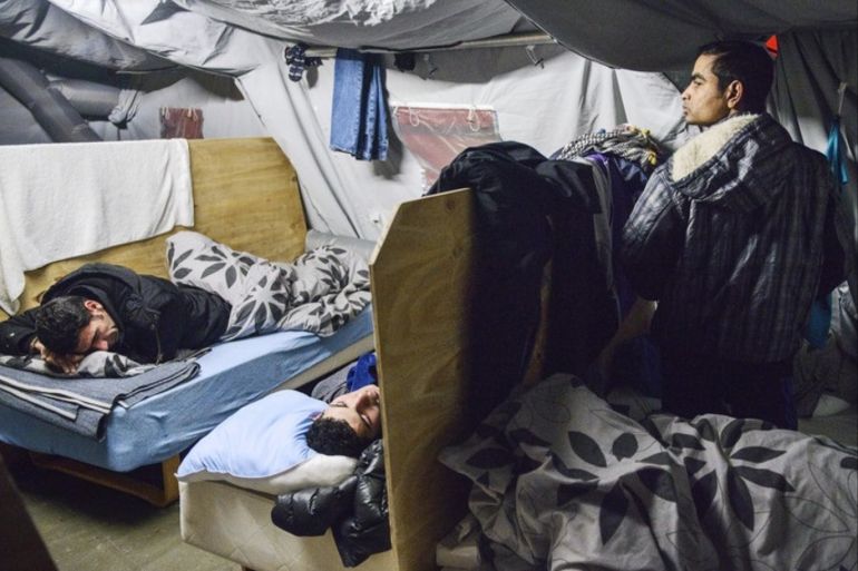 epa05126719 (FILE) A file photo dated 13 January 2016 showing refugees in their beds at the refugee tent camp in Thisted, northern Jutland, Denmark. The camp contains small appartment areas in the gym, bunkbeds and tents. Danish lawmakers were 26 January 2016 set to vote on measures to tighten asylum laws, including a controversial plan to seize assets from asylum seekers to pay for their stay, despite criticism from human rights groups. The bill was expected to pass as