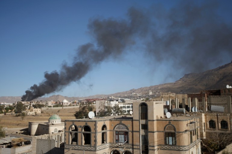 Smoke rises after an airstrike on the military site in Sanaa, Yemen January 11, 2018. REUTERS/Mohamed al-Sayaghi
