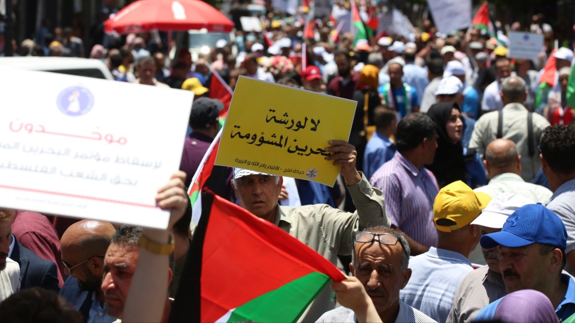 epa07670401 Palestinians protest against the expected US peace place in ramallah, West Bank , 24 June 2019. According to media reports, the US will hold an economic conference in Bahrain on 25 and 26 June, trying to promote investments in the Palestinians territories as the first part of the Middle East peace plan named also 'Deal of the Century'. Palestinian officials are boycotting the deal and have refused to engage with its Middle East peace plan. EPA