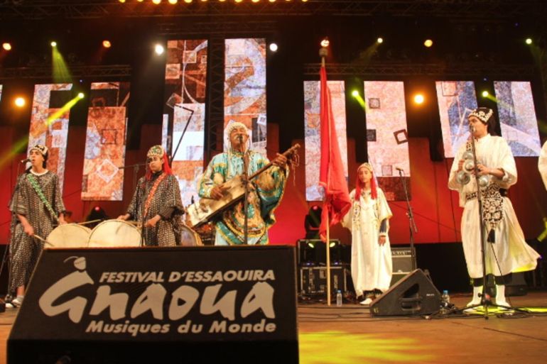 عبد الغني بلوط - عبد الغني بلوط/ فرقة موسيقية تقدم عروضها في مهرجان كناوة/ المغرب/ الصويرة - كناوة" مهرجان عالمي يسعى إلى اعتراف اليونسكو