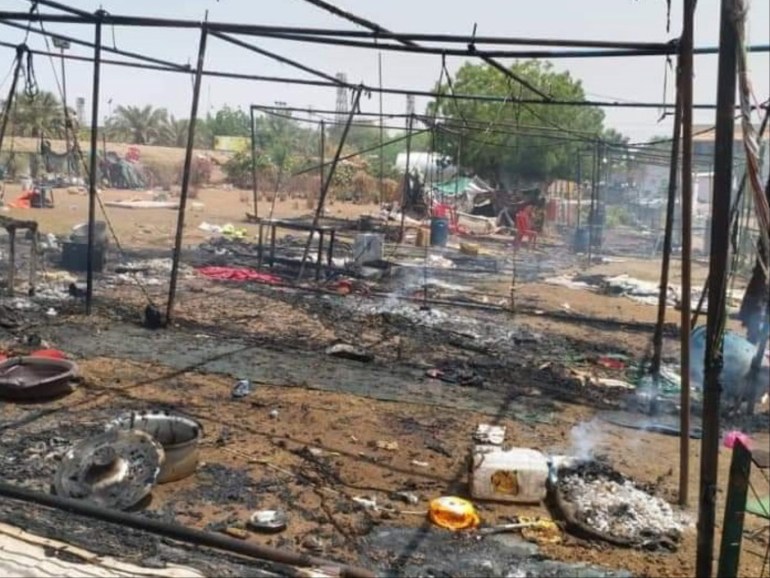 epa07622337 Smoke rising from burned tents inside the sit-in site outside the Sudanese army Headquarters, few hours after news of an early morning clearing by security forces from various media reports, in Khartoum, Sudan, 03 June 2019. according to media reports: 13 protesters were killed and several others injured on clashes between the Sudanese protester and Sudan military to break up a sit-in. in retaliation, after the opposition called for national civil disobedience to put pressure on the Transitional Military Council (TMC) to hand power over to a civilian administration. EPA-EFE/MARWAN ALI