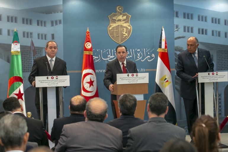 Khemaies Jhinaou - Sameh Shoukry - Sabri Boukadoum- - TUNIS, TUNISIA - JUNE 13 : Tunisian Foreign Minister Khemaies Jhinaoui (C), Egyptian Foreign Minister Sameh Shoukry (R) and Algerian Foreign Minister Sabri Boukadoum (L) hold a press conference after a meeting in Tunis, Tunisia on June 13, 2019.