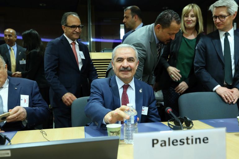 AHLC meeting in Brussels- - BELGIUM, BRUSSELS - APRIL 30 : Palestinian Prime Minister Mohammad Shtayyeh (C) attends the annual spring meeting of the International donor group for Palestinians, the Ad Hoc Liaison Committee (AHLC) at the EU headquarters in Brussels, Belgium on April 30, 2019. High Representative of the European Union for Foreign Affairs and Security Policy Federica Mogherini, EU-Commissioner for European Neighbourhood and Enlargement Negotiations, Johanne