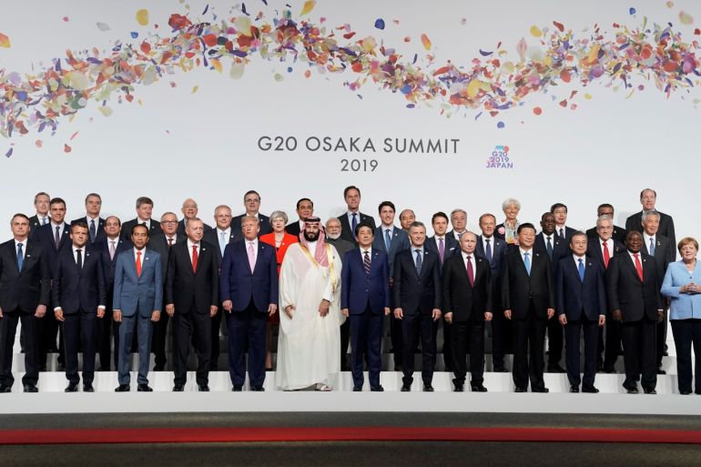 Leaders and delegates attend a family photo session at the G20 leaders summit in Osaka, Japan, June 28, 2019. REUTERS/Kevin Lamarque