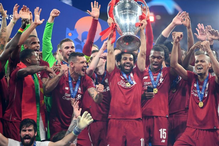 MADRID, SPAIN - JUNE 01: Mohamed Salah of Liverpool lifts the Champions League Trophy following the UEFA Champions League Final between Tottenham Hotspur and Liverpool at Estadio Wanda Metropolitano on June 01, 2019 in Madrid, Spain. (Photo by Michael Regan/Getty Images)