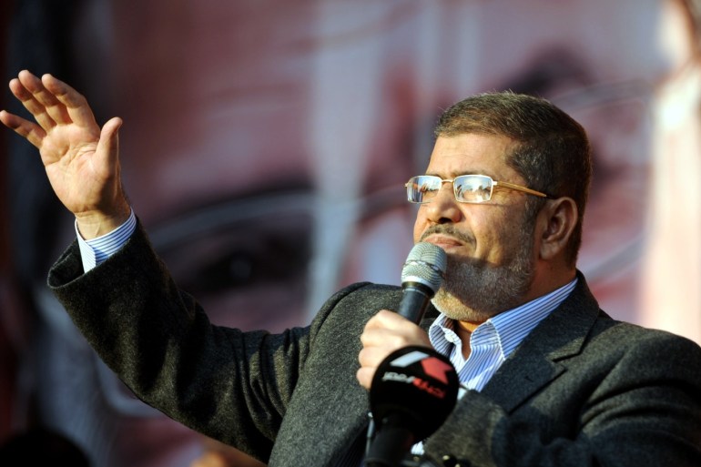Egypt's ex-President Morsi dies during trial- - CAIRO, EGYPT - (ARCHIVE) : A file photo dated November 23, 2012 shows Ousted Egyptian President Mohamed Morsi addressing the crowd in front of Presidential Palace in Cairo, Egypt. Egypt’s first democratically-elected president, Mohamed Morsi, 67, died Monday during a court trial on espionage charges.