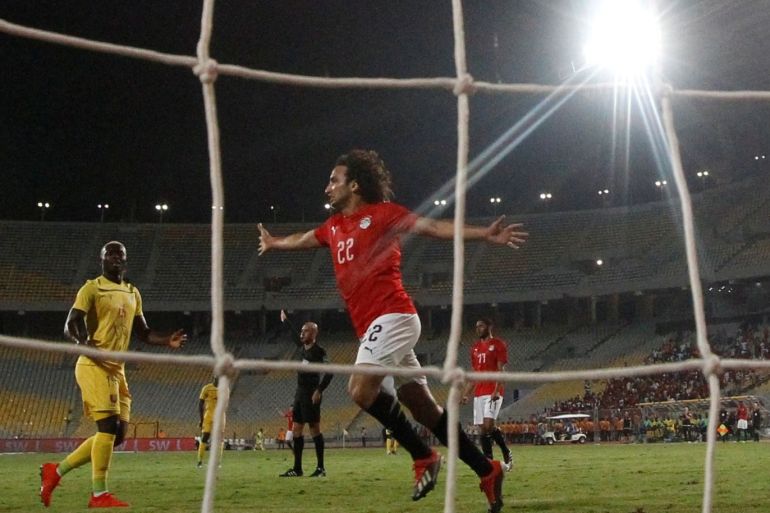 Soccer Football - International Friendly - Egypt v Guinea - Borg El Arab, Alexandria, Egypt - June 16, 2019 Egypt's Amr Warda celebrates their third goal, scored by Omar Gaber REUTERS/Amr Abdallah Dalsh