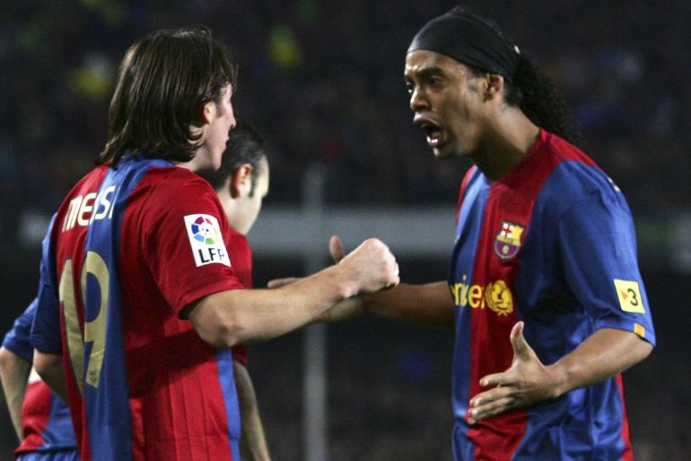 BARCELONA, SPAIN - MARCH 10: Lionel Messi (L) of Barcelona celebrates with Ronaldinho after scoring Barcelona's 2nd goal during the Primera Liga match between Barcelona and Real Madrid at the Nou Camp stadium on March 10, 2007 in Barcelona, Spain. (Photo by Denis Doyle/Getty Images)