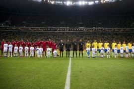 BRASILIA, BRAZIL - JUNE 05: Players of Brazil and of Qatar line up before the International Friendly Match between Brazil and Qatar at Mane Garrincha Stadium on June 5, 2019 in Brasilia, Brazil. (Photo by Buda Mendes/Getty Images)