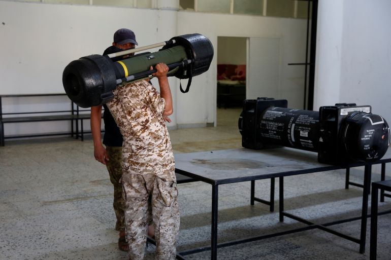 A member of forces allied to Libya's internationally recognized government holds one of American Javelin anti-tank missiles, which were confiscated from eastern forces led by Khalifa Haftar in Gharyan, in Tripoli, Libya June 29, 2019. REUTERS/Ismail Zitouny